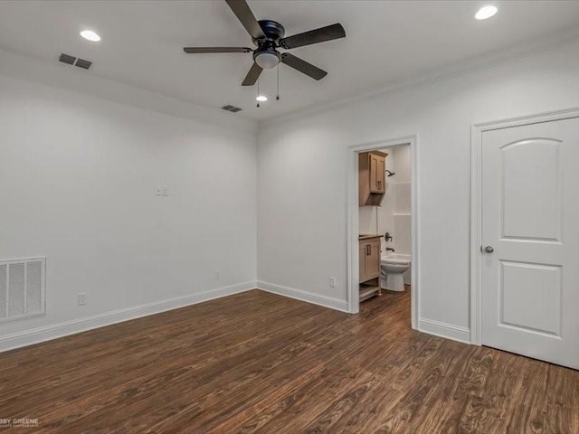 unfurnished bedroom featuring visible vents, recessed lighting, and dark wood-style floors