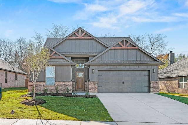 craftsman-style home featuring a front lawn, driveway, a garage, brick siding, and board and batten siding