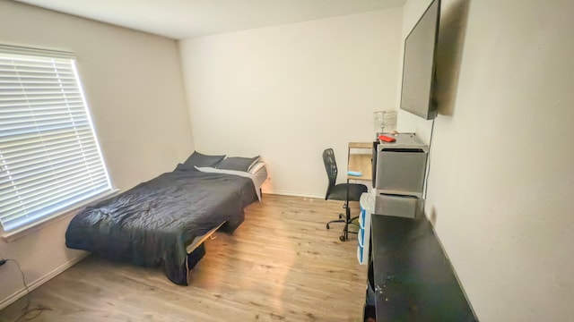 828 Costlow Ln, Fate, TX 75189 - bedroom with light wood finished floors