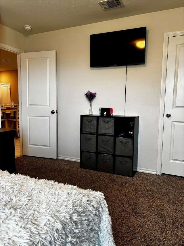 828 Costlow Ln, Fate, TX 75189 - carpeted bedroom featuring baseboards