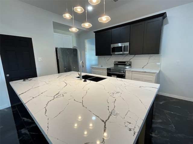 818 Rd 5607, Cleveland, TX 77327 - kitchen with marble finish floor, a kitchen island with sink, appliances with stainless steel finishes, and a sink