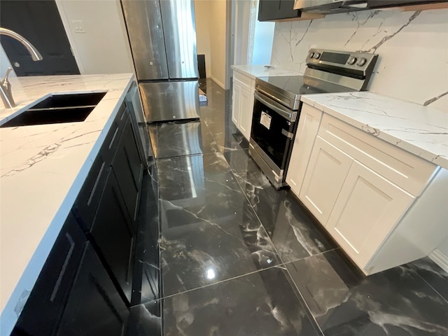 818 Rd 5607, Cleveland, TX 77327 - kitchen featuring marble finish floor, a sink, light stone counters, and electric range