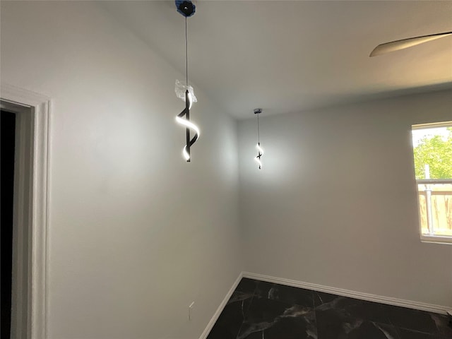 818 Rd 5607, Cleveland, TX 77327 - unfurnished dining area with baseboards and marble finish floor