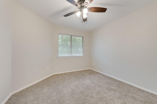 unfurnished room featuring ceiling fan, baseboards, and carpet flooring