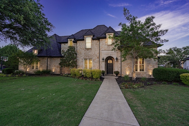 147 Stoneleigh Dr, Heath, TX 75032 - french country style house featuring stone siding and a front yard
