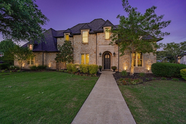 147 Stoneleigh Dr, Heath, TX 75032 - french country style house with stone siding and a yard