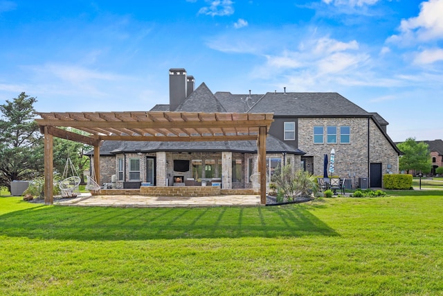 rear view of property with a pergola, a yard, a patio area, and a chimney