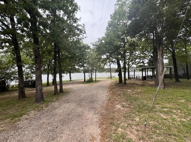 113 Daniel Dr, Mabank, TX 75156 - view of road with driveway and a water view
