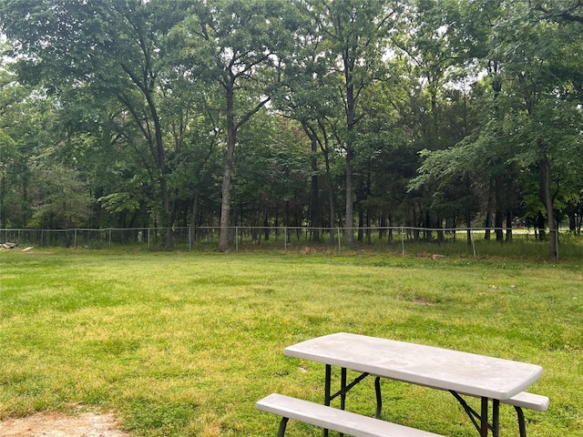 113 Daniel Dr, Mabank, TX 75156 - view of yard featuring a wooded view and fence