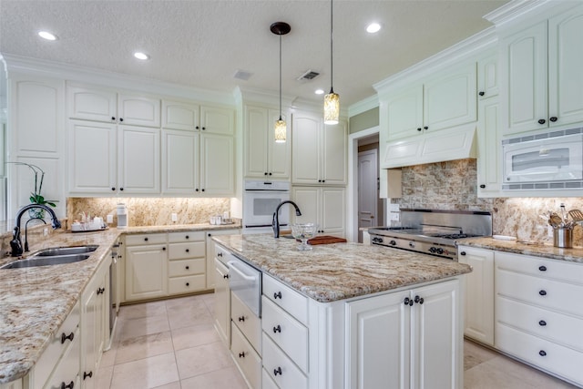 6001 Laurel Valley Ct, Fort Worth, TX 76132 - kitchen with white appliances, a warming drawer, backsplash, a center island with sink, and light stone counters