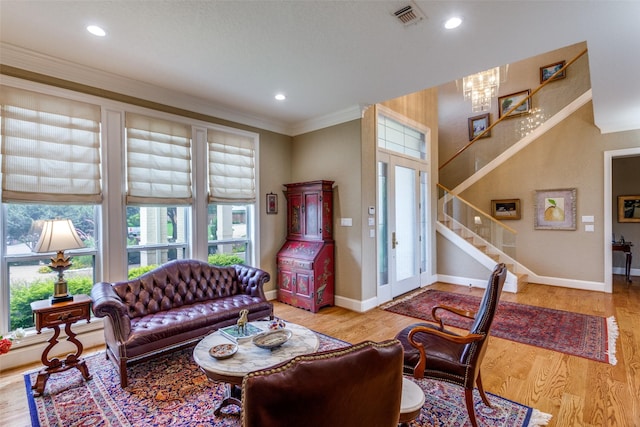 6001 Laurel Valley Ct, Fort Worth, TX 76132 - living area featuring crown molding, light wood-style flooring, a chandelier, stairs, and recessed lighting