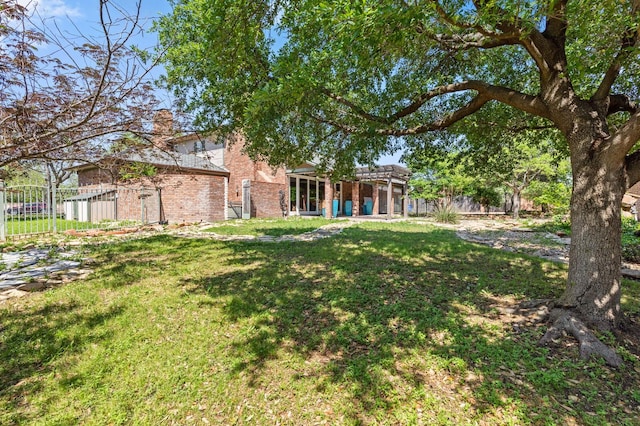 view of yard with fence