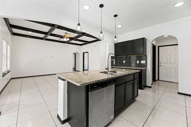 kitchen featuring arched walkways, coffered ceiling, stainless steel dishwasher, and a sink