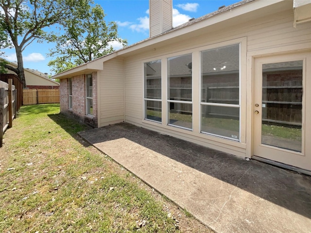 view of yard with a fenced backyard and a patio
