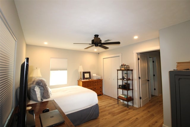 bedroom featuring recessed lighting, light wood-type flooring, a closet, and ceiling fan