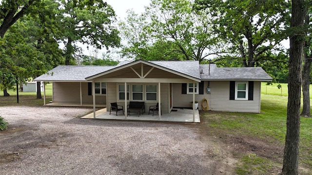 10139 Fm 3441, Malakoff, TX 75148 - back of property with roof with shingles and a yard
