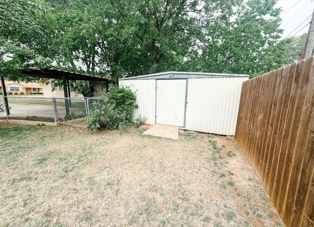 view of shed with fence