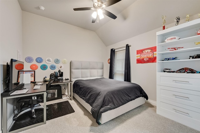 bedroom with ceiling fan, carpet floors, vaulted ceiling, and baseboards