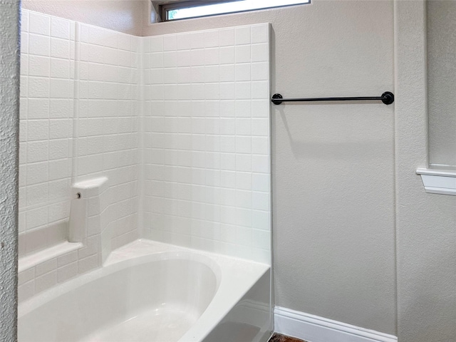 1114 N Elm St, Weatherford, TX 76086 - full bath with a textured wall and shower / washtub combination