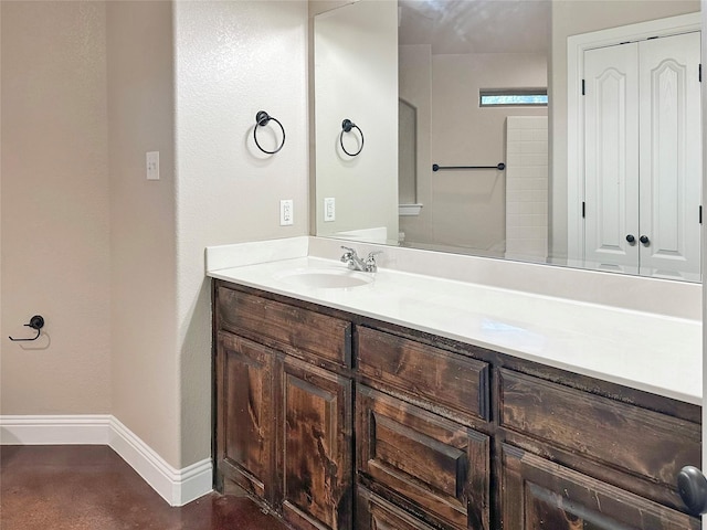 1114 N Elm St, Weatherford, TX 76086 - bathroom featuring baseboards and vanity