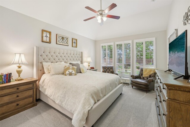 3204 Discovery Dr, Little Elm, TX 75068 - bedroom featuring light colored carpet, vaulted ceiling, and a ceiling fan