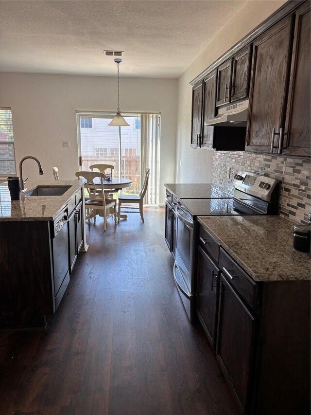 kitchen with a sink, dark wood finished floors, electric range, dishwashing machine, and under cabinet range hood