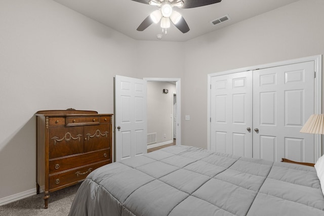 bedroom with baseboards, visible vents, a closet, and carpet flooring