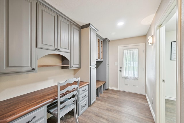 108 N Westlake Dr, Leonard, TX 75452 - office with built in desk, light wood-style flooring, and baseboards