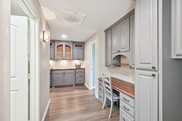 108 N Westlake Dr, Leonard, TX 75452 - mudroom with baseboards, wood finished floors, built in study area, and recessed lighting