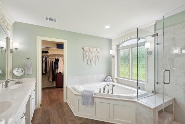 108 N Westlake Dr, Leonard, TX 75452 - full bathroom featuring a stall shower, a garden tub, and wood finished floors