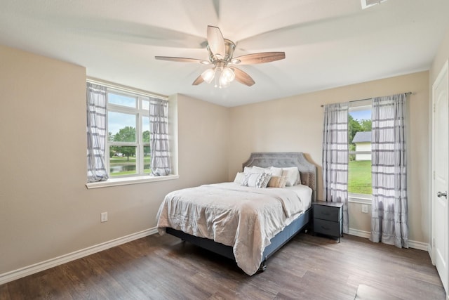 108 N Westlake Dr, Leonard, TX 75452 - bedroom with multiple windows, baseboards, wood finished floors, and ceiling fan