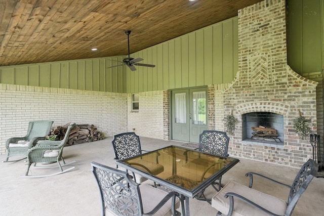 108 N Westlake Dr, Leonard, TX 75452 - view of patio / terrace featuring a fireplace, outdoor dining area, french doors, and a ceiling fan
