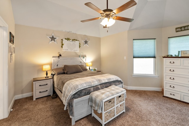 carpeted bedroom featuring ceiling fan, vaulted ceiling, and baseboards
