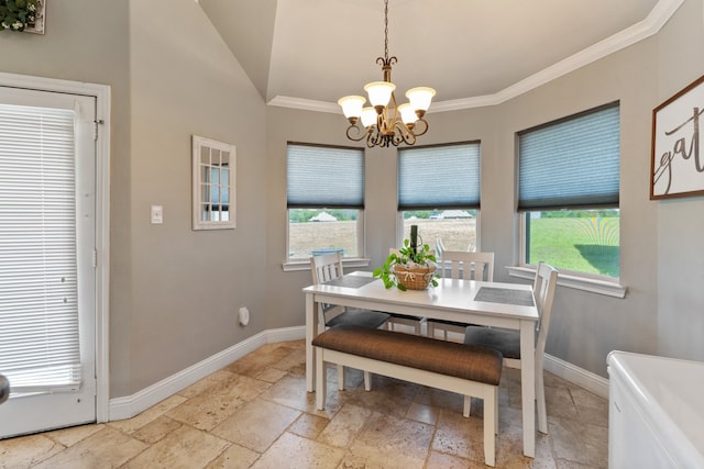 dining area with stone tile flooring, baseboards, a notable chandelier, lofted ceiling, and crown molding