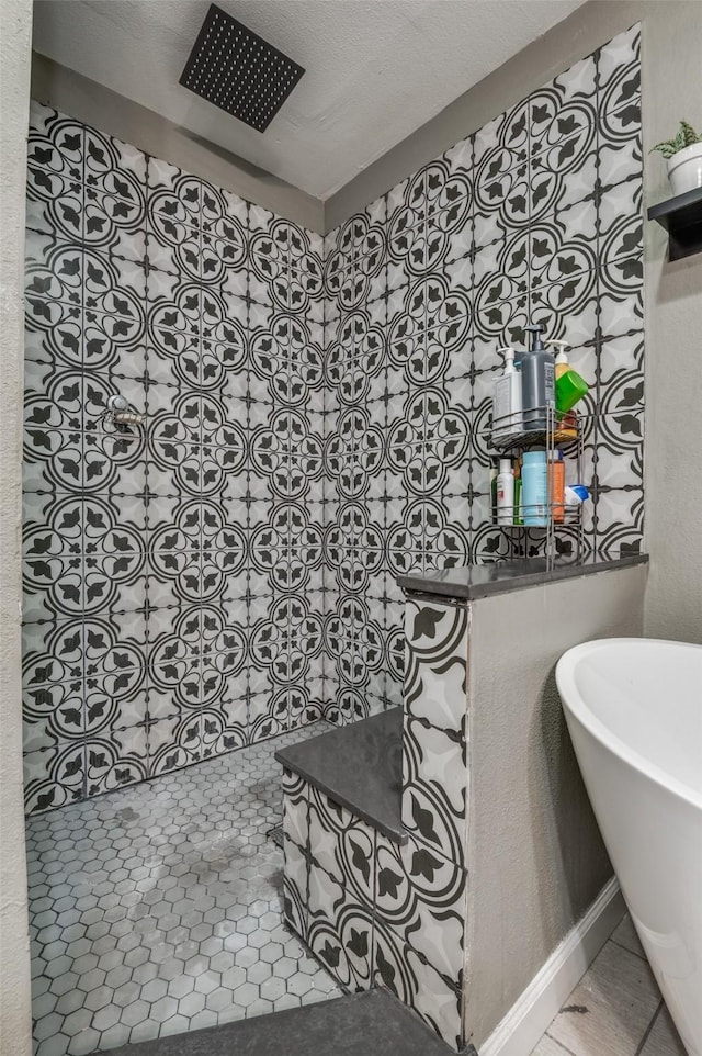 411 E Ross St, Waxahachie, TX 75165 - bathroom with a walk in shower and a freestanding bath