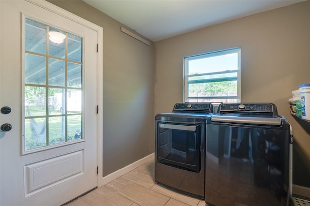 411 E Ross St, Waxahachie, TX 75165 - laundry area featuring washing machine and clothes dryer and baseboards