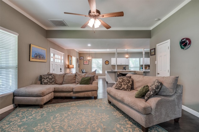411 E Ross St, Waxahachie, TX 75165 - living room with baseboards, crown molding, and ceiling fan