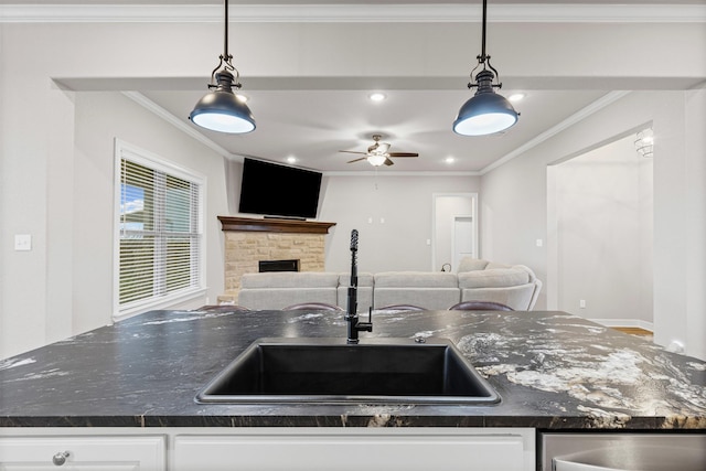 2210 County Road 1104, Cleburne, TX 76031 - kitchen with white cabinets, open floor plan, and a sink