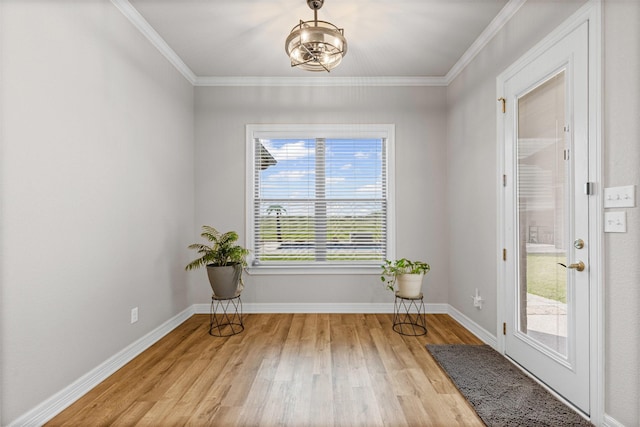 2210 County Road 1104, Cleburne, TX 76031 - entryway featuring baseboards, ornamental molding, and light wood-style flooring