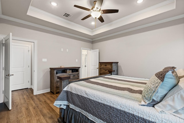 2210 County Road 1104, Cleburne, TX 76031 - bedroom featuring ornamental molding, wood finished floors, visible vents, and a raised ceiling