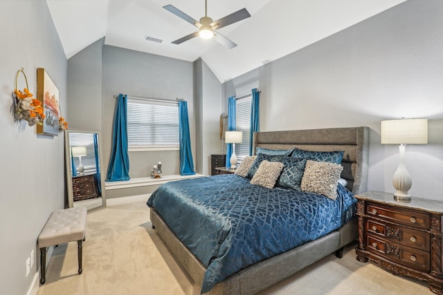 bedroom featuring carpet flooring, visible vents, ceiling fan, baseboards, and vaulted ceiling