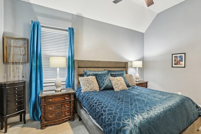 bedroom with lofted ceiling, carpet, and a ceiling fan
