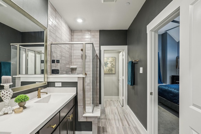 bathroom featuring a stall shower, visible vents, and vanity
