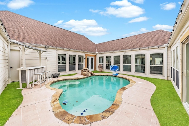 pool with a patio