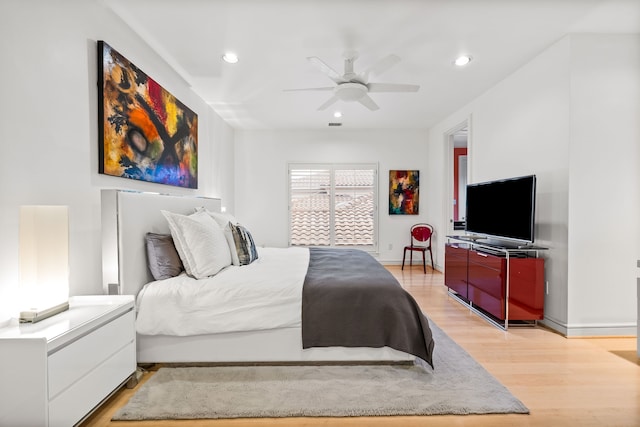 5608 Stone Cliff Ct, Dallas, TX 75287 - bedroom featuring baseboards, recessed lighting, light wood-style floors, and ceiling fan