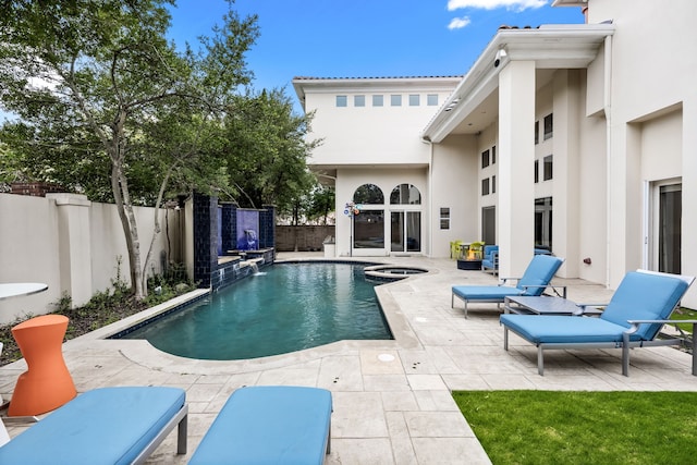 5608 Stone Cliff Ct, Dallas, TX 75287 - view of pool featuring a fenced backyard, a patio, a fenced in pool, and an in ground hot tub