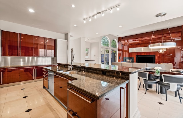 5608 Stone Cliff Ct, Dallas, TX 75287 - kitchen with modern cabinets, decorative light fixtures, recessed lighting, and a spacious island