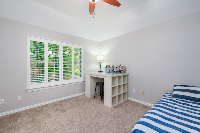bedroom with carpet, baseboards, and a ceiling fan