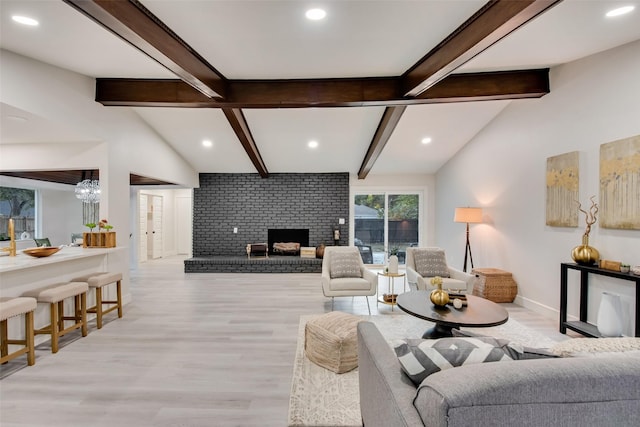 5925 Forest Haven Trl, Dallas, TX 75232 - living area featuring vaulted ceiling with beams, wood finished floors, recessed lighting, and a brick fireplace