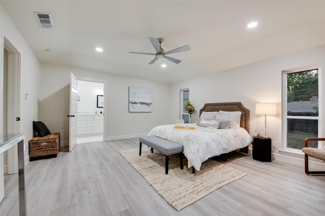 5925 Forest Haven Trl, Dallas, TX 75232 - bedroom with ensuite bathroom, light wood finished floors, baseboards, visible vents, and recessed lighting